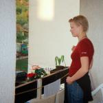 Nadžija H. (2000)  - This picture reminds me of how my husband looked down to us from the balcony when my daughters and I fled from our house in Srebrenica. 
(He has been missing since the fall of Srebrenica)