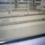 Selma M. (2000)  - This is the schoolyard in Srebrenica where the first grenade fell. An air raid here killed over 100 people and injured more than 200 in a single day.