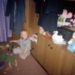 Timka S. (2000)  - My grandson playing with his friend. He reminds me of my children. I have survived to experience the joy and contentment of watching him play.